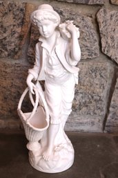 Glazed White Porcelain Figurine Of Boy With Flower Basket.