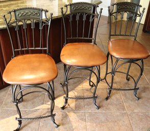 Includes 3 Ornate Wrought Aluminum Swivel Counter Stools