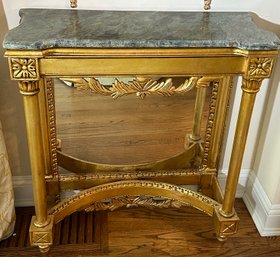 Vintage Carved Giltwood Louis XVI French Style Console With A Marble Stone Top And Mirrored Bottom Backsplash