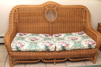 Pristine, Natural Wicker Love Seat Or Setteewith Floral Pillows.