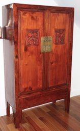 Mid-20th Century Chinese Wood Armoire Cabinet With 2 Carved Panels & Large Brass Lock With Pin