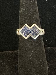 STERLING SILVER RING WITH FACETED SAPPHIRE STONES AND DIAMOND PAVE ACCENTS