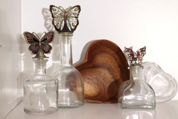 Decorative Butterfly Perfume Bottles Including A Polished Carved Wood Bowl In The Shape Of Heart