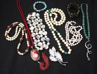Vintage Jewelry Includes 5 Beaded Pearl Style Necklaces, Rhinestone Pin, Unicorn Pendant And More.