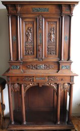 19th Century Renaissance Style Double Cabinet With Carved Wooden Doors And Inset Marble Panels.