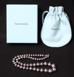 Tiffany Sterling Silver Graduated Bead Necklace 15 Inches Long With Original Pouch And  Box.