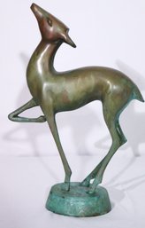 Art Deco Style Prancing Deer With A Green Patina.