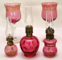Lot Of 3 Vintage Ruby Glass Items With 3 Miniature Oil Lamps And 2 Wine Glasses.