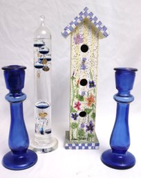 Hand Painted Vertical Birdhouse, Glass Floater And Blue Glass Candlesticks.