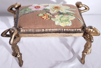 Diminutive, Gilded Iron Footstool With Caryatids And Needlepoint Top.