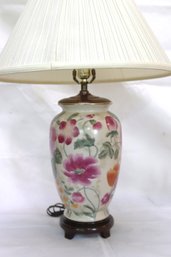 Vintage Porcelain Lamp With Pink Flowers On Wooden Stand