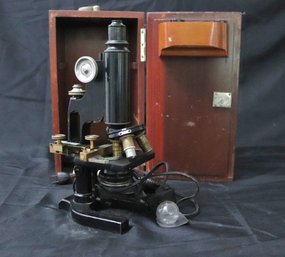 Vintage Microscope With Electric Light In Wooden Box With Lock.
