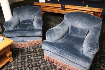 Pair Of Cozy Custom Swivel Chairs With A Navy Toned Microfiber Fabric And Tassel Accents