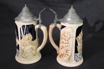 Two Vintage German Beer Steins With Metal Lids, And Designs Of Sailing Ships And Musicians Of Bremen.