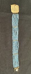 14K YG 7.25 Inch 5 Strand Pale Blue Beaded Bracelet -Italy