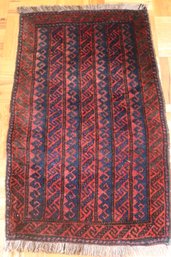 Small Afghani Turkoman Area Rug In Deep Maroon And Blue Colors.