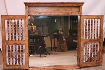 Rustic Wall Mirror With Carved Wood Doors.
