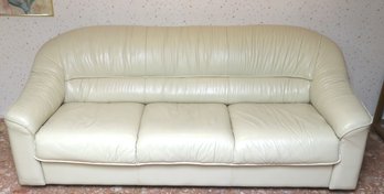 Late 80s Era, Italian Made Leather Sofa In A Butter Cream Color.