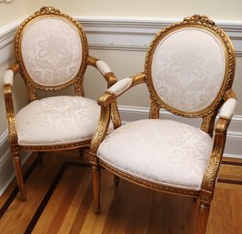 Pair Of French Gilt-wood Armchairs With Round Backs And Off-white Fabric.