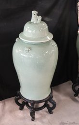 Tall Ceramic Jade Green Ginger Jar With Craquelure Finish And Foo Dog On Black Footed Stand