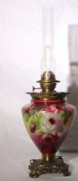 Antique Converted Hurricane Gas Lamp With Floral Painted Glass And Pierced Brass Base.