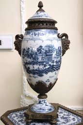 Castilian Bronze Mounted Blue And White Porcelain Urn, With Painted Asian Scenery, And Deity With Rams Head H