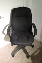 Adjustable Swiveling Office Chair With Fabric Upholstery.