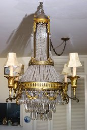 Elegant Bronze And Crystal 1920s Era 7 Light Chandelier With 3 Tiers Of Crystals