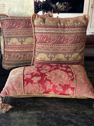 3 Medium Sized Throw Pillows Of Assorted Sizes