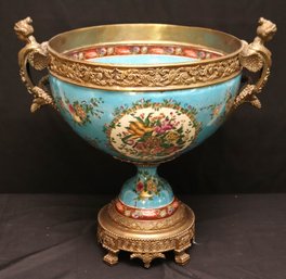 Sevres Style Bronze And Porcelain Centerpiece With Floral Panels Painted On A Dark Teal Background.