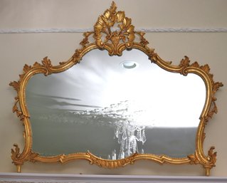 Large, Ornate Italian Baroque Mirror With Spectacular Carved Frame And Crown Featuring Basket Of Flowers