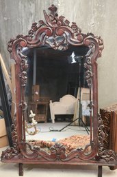 Ornately Carved Mahogany Toned Mirror With Attachments.