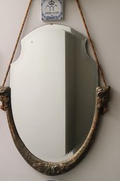 Art Deco Wall Mirror In A Shield Shape With Half Frame.