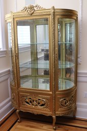 French Curved Glass Etagere With Gilt Wood Frame And Carved Panels, To Display Your Treasured Collection