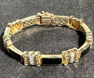 14K YG 7 INCH DIAMOND AND ONYX LINK BRACELET - SIGNED MCD