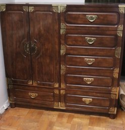 Mans Armoire Dresser Cabinet With An Asian Flair And Brass Adornments.