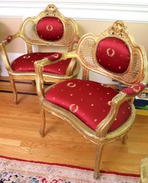 Pair Of Gold Framed French Style Salon Chairs With Burgundy Napoleonic Laurel Crown Upholstery.