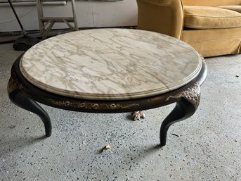 Hollywood Regency Style Veined Marble Top Coffee Table On Ebonized Wood Base Highlighted With Floral Accents