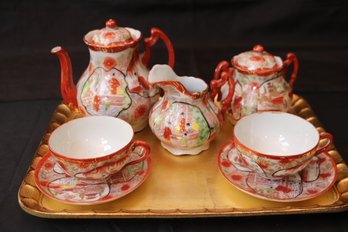 Japanese 5-piece Tea Set With Decorative Scenes Painted In Orange And Gold