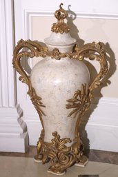 Tall, Elegant French Urn With Bronze Mounts On A Light Beige Background Of Faux Marble