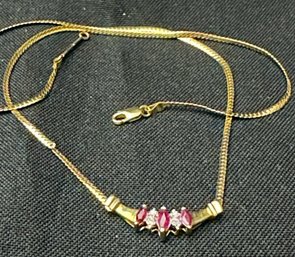 10K YG Diamond/Ruby Fied Pendant On 17 Inch S Link Necklace