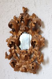 Italian Rococo Style Scirocco Wood Mirror With Fancy Scroll Work.