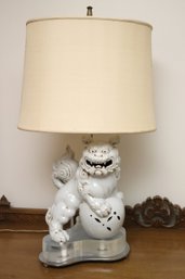 1970s White Porcelain Foo / Shishi Dog Table Lamp Mounted On Lucite Base Over Chrome