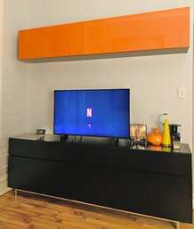 2 Pc. Bo Concept Entertainment Center In Black And Orange Lacquer. Contents And Television Not Included