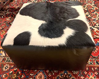 A Brown And White Cow Hide And Leather Ottoman Foot Stool/ Table On Wood Base.