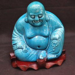 Blue Glazed Ceramic Chinese Buddha Sculpture On A Wood Stand