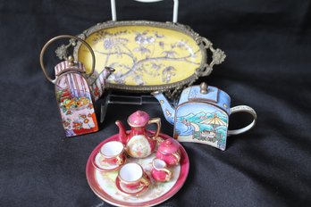 Lot Of Miniature Items With Tea Set, 2 Enamel Teapots, And Soap Dish.