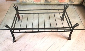 Wrought Iron Base Coffee Table With A Textured Finish, Glass Top And Lower Shelf