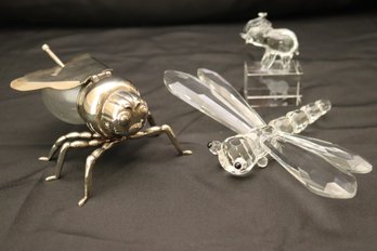 Assorted Glass Items With Elephant, Large Dragonfly, And Honey Container.