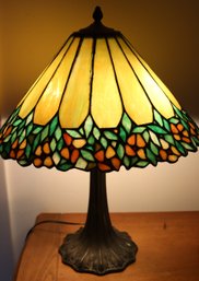 Pretty Slag Glass Table Lamp With Ornate Floral Base And Yellow, Orange & Green Tones